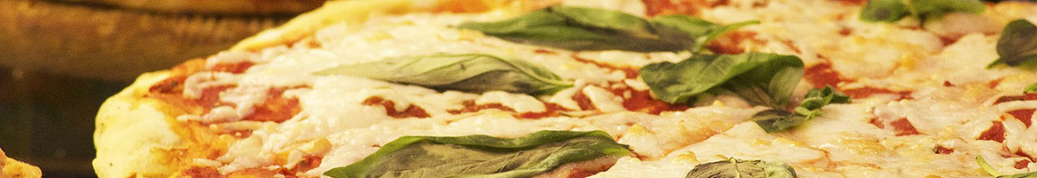 Eating Italian Pizza Sandwich at Giovanni's Pizza restaurant in Fullerton, CA.